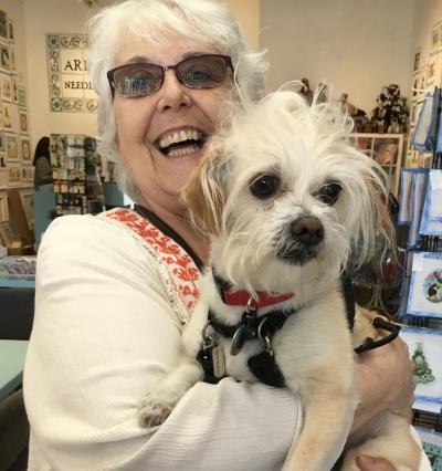 Volunteer Barbara Courtois with Moose the dog